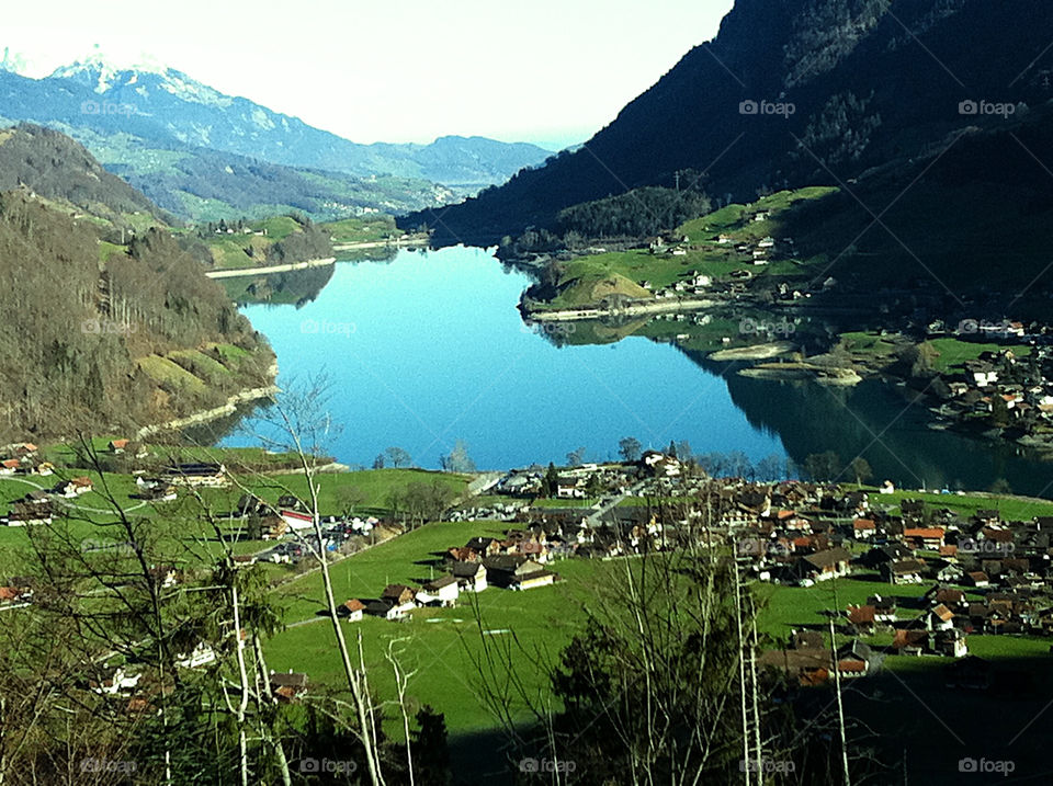 a mountain lake in heidi land by swisstraveler