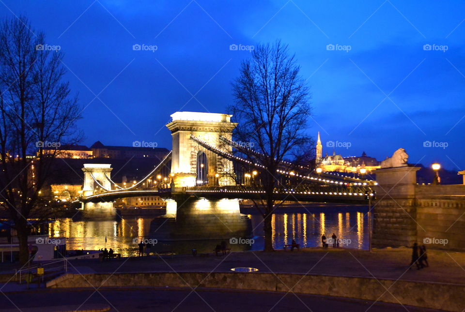 Chain Bridge, Budapest. a blue sky sunset backdropping the grandest of bridges in Budapest, the Chain Bridge taken from the Pest side