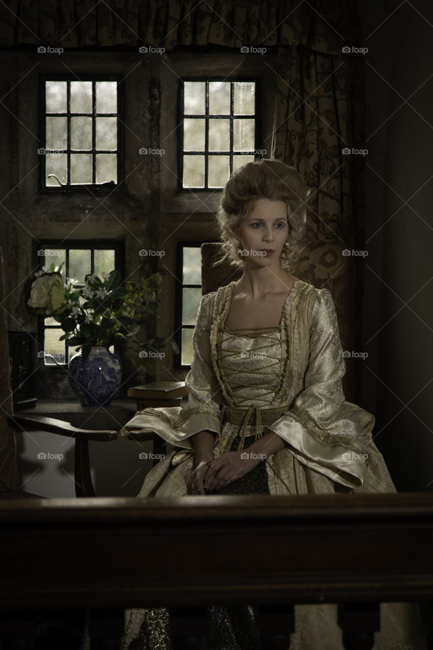 This is one of a set taken in a 17th century house. It is now a restaurant. The shoot was based on the Marie Antoinette look. 