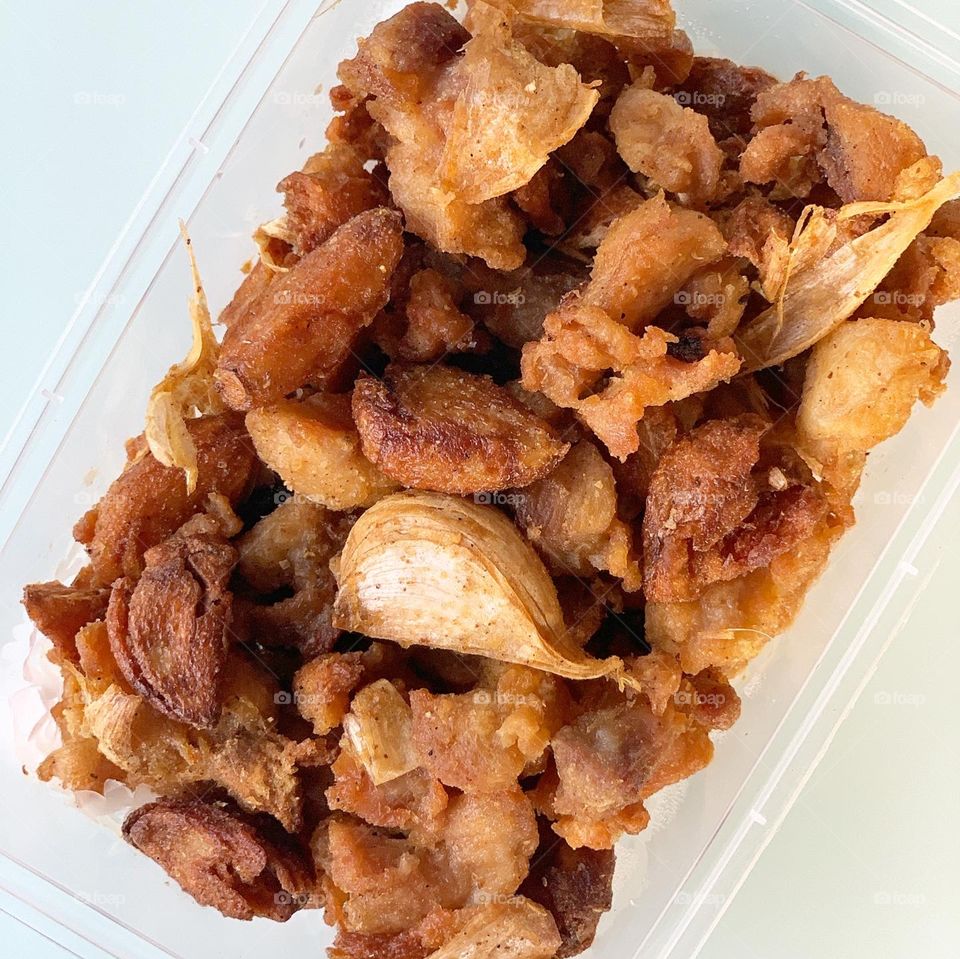 Teo chew bak kut Teh with fried chicken garlic, French beans with hae bee hiam, pig trotters and intestines meal