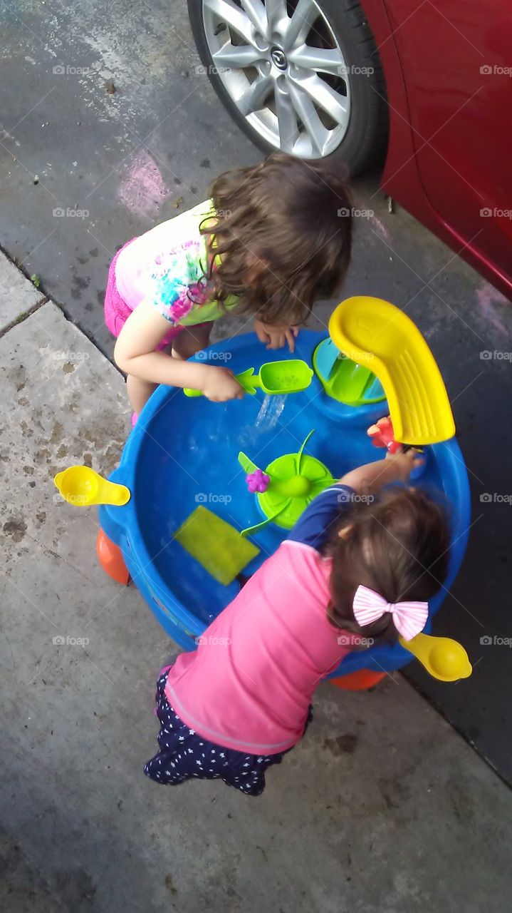 Toddlers enjoying Dory water table.