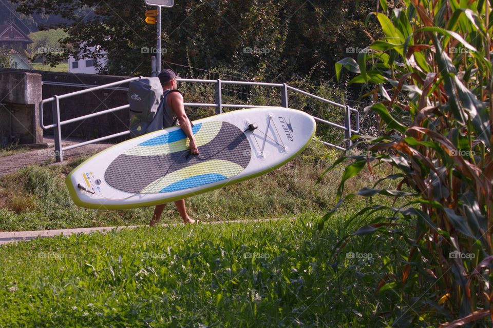 Man With Paddling Board