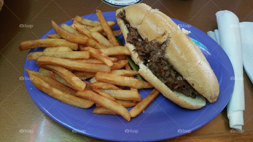 cheesesteak and fries