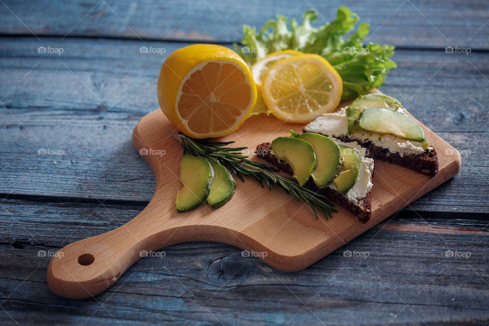 Dietary sandwiches with grain bread, cream cheese and avocado