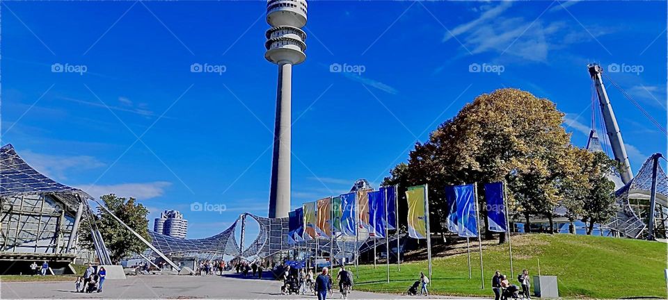 Seen from a bit further away this „Munich“, Germany „Olympic stadium“ built for the games of 1973 shows both the futuristic aspect and how it merges with the traditional „Bavarian“ land- as well as cityscapes. 2022. Hypnotic Productions