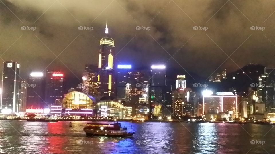 Hong Kong Harbour at Night. Looking at night skyline over the harbour in Hong Kong 