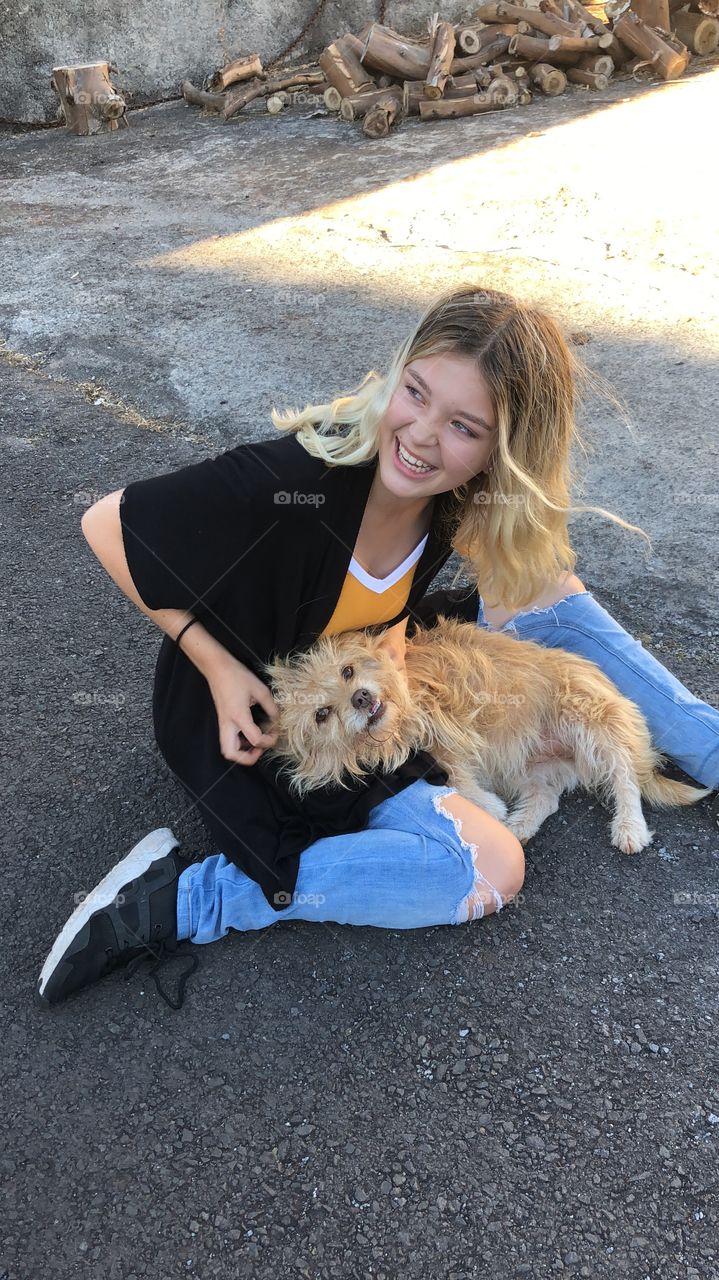 Dog and child smiling 