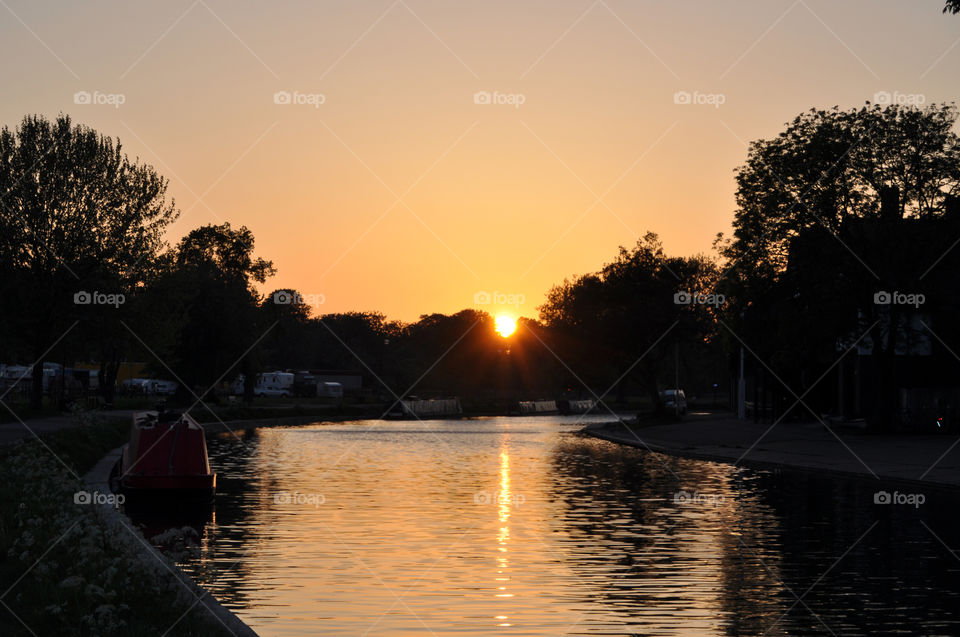 Scenic view of lake during sunset