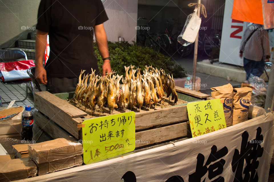 grilled fish on a stick
