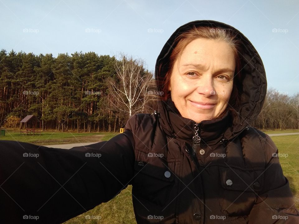 selfie girl on the nature in the solar light