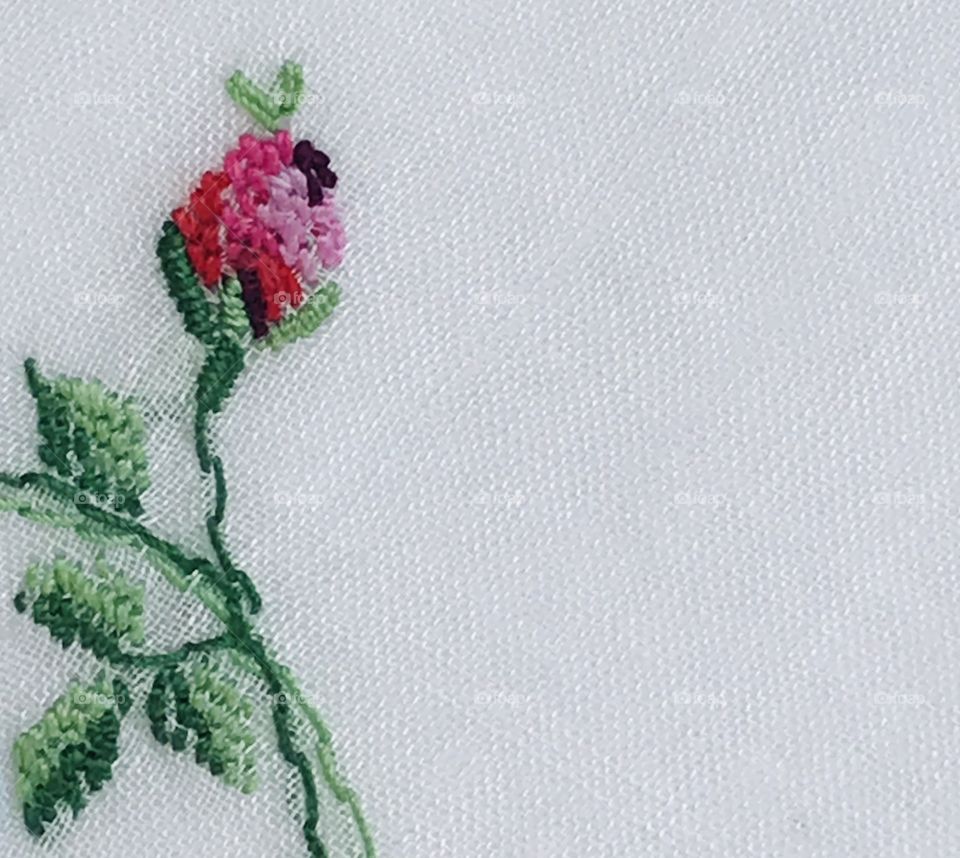 Floral hand embroidery background with empty space