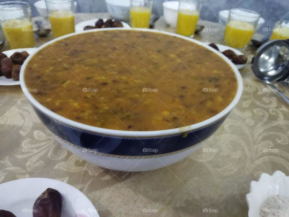 Moroccan table in Ramadan month:  Soup. Date and eggs juice.