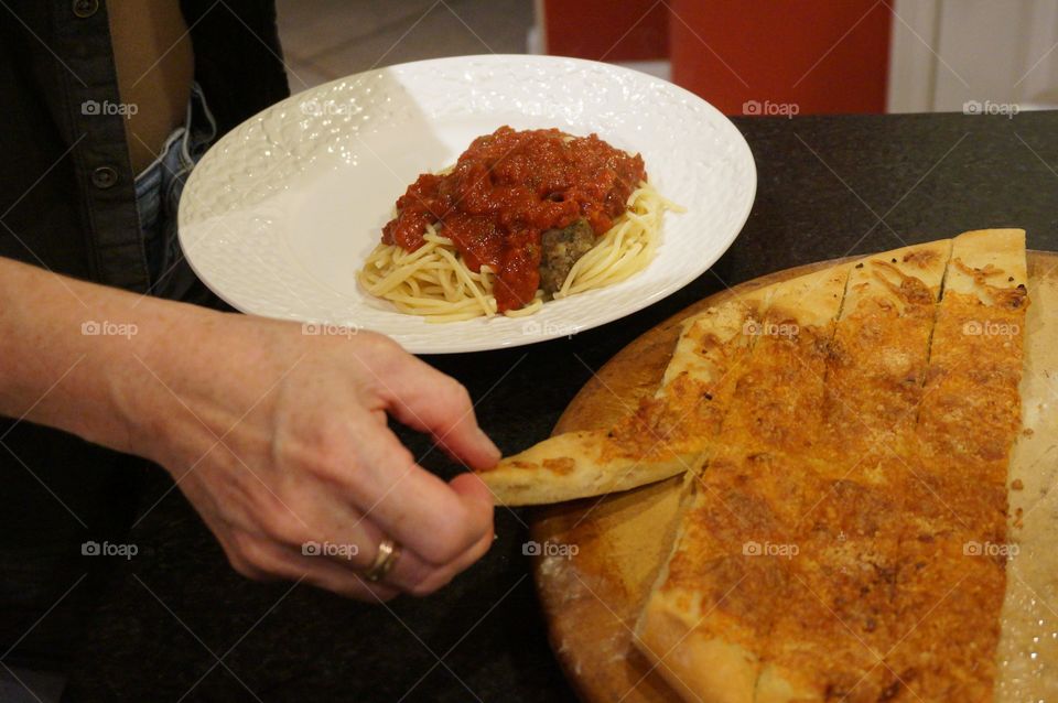 Saucy pasta and cheesy garlic bread