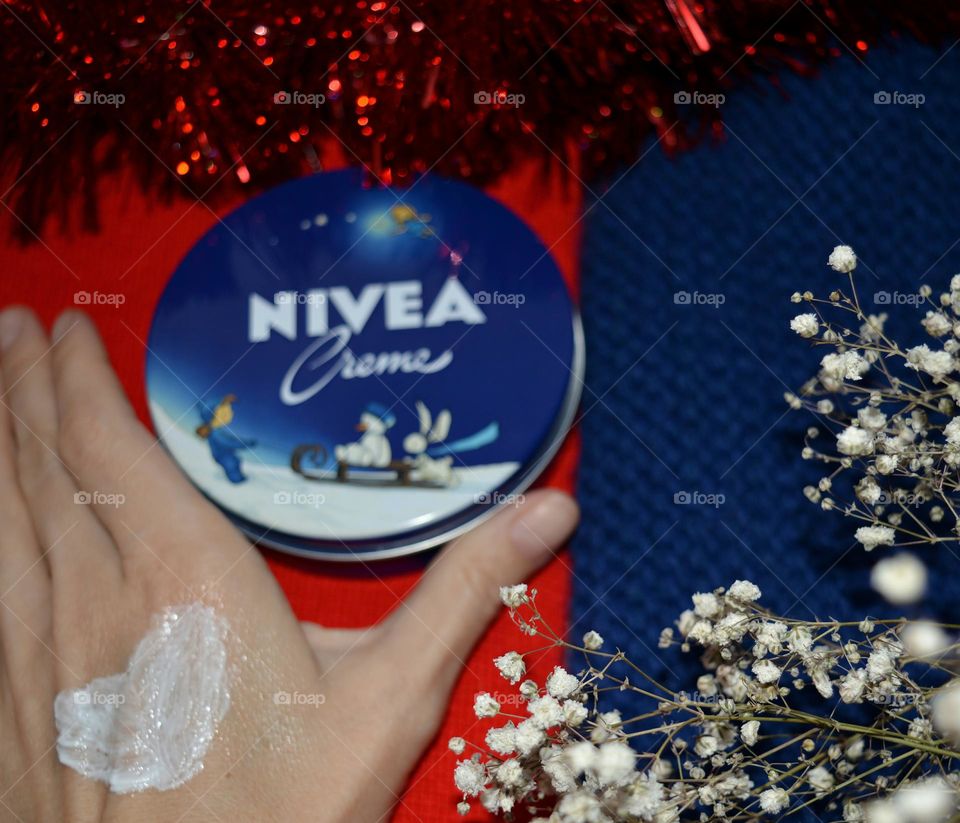 Nivea cream in the hand products love