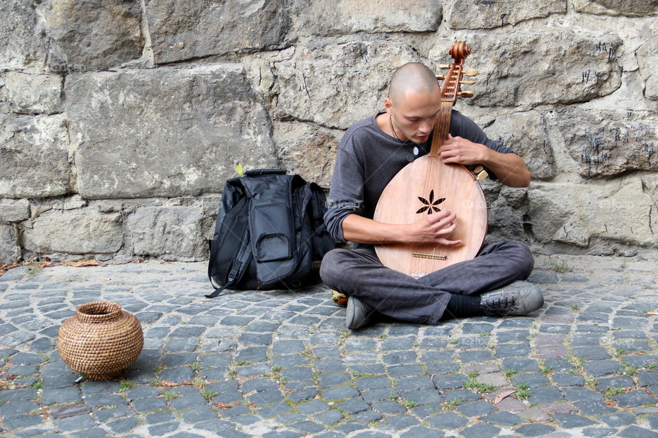 Ukrainian bandura player.. When I was in Lviv, I saw this beautiful street musician and photographed it.