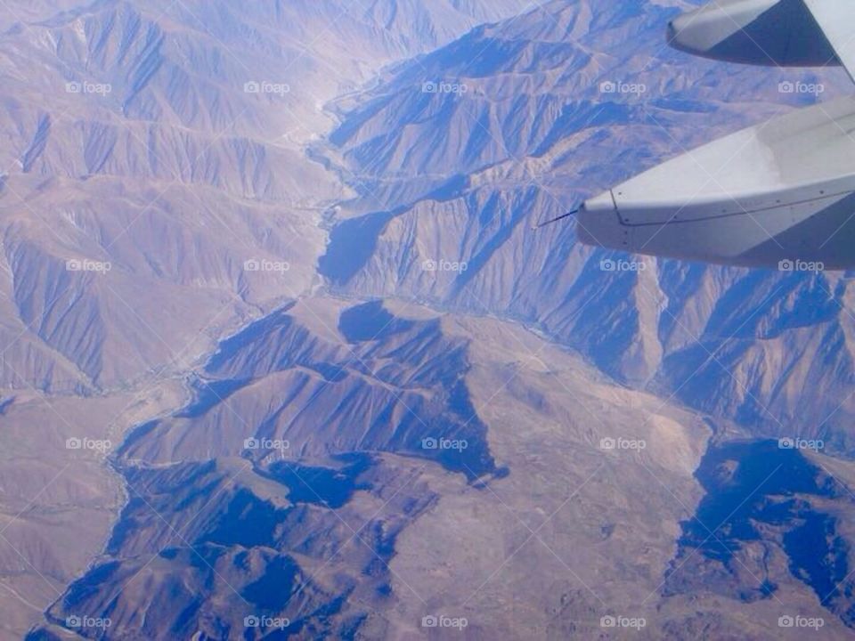 Flying over Andes mountain range 