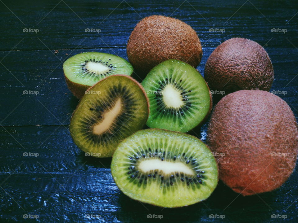 kiwi on a black background