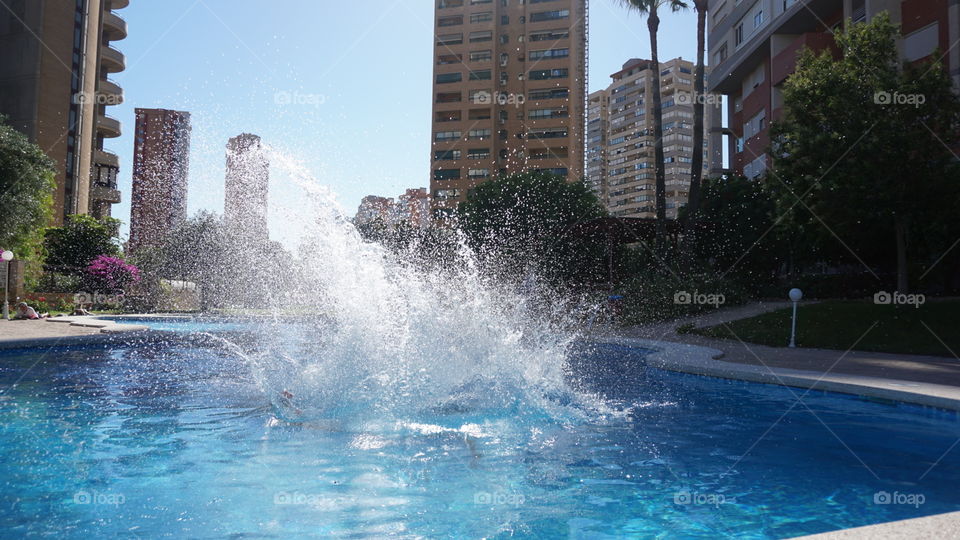Swimmingpool#splash#jump#urban#buildings#water