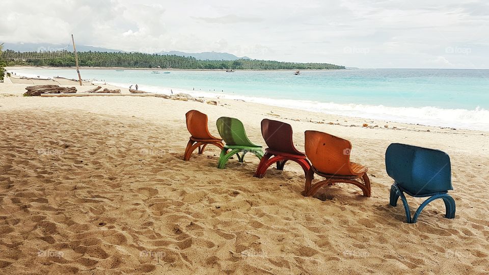 chairs made of tires at the beach