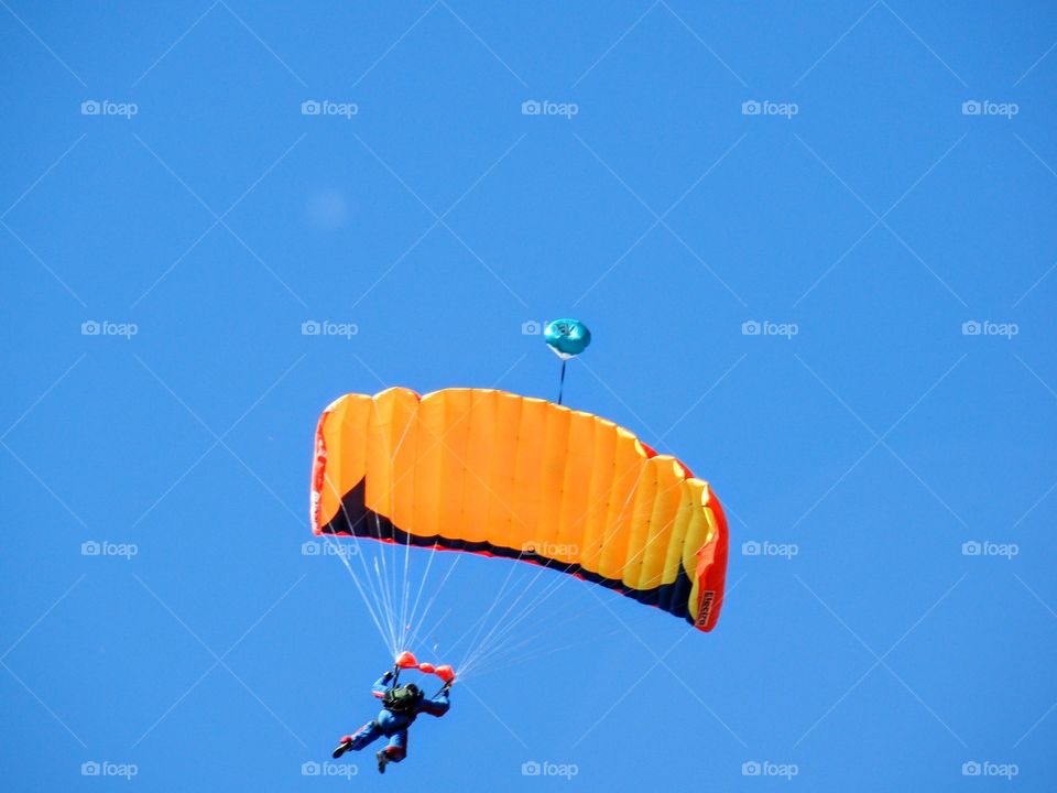 The man in the sky with a parachute