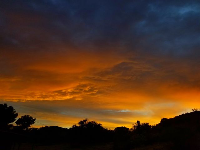 Orange Sunset Against a Dark Blue Sky