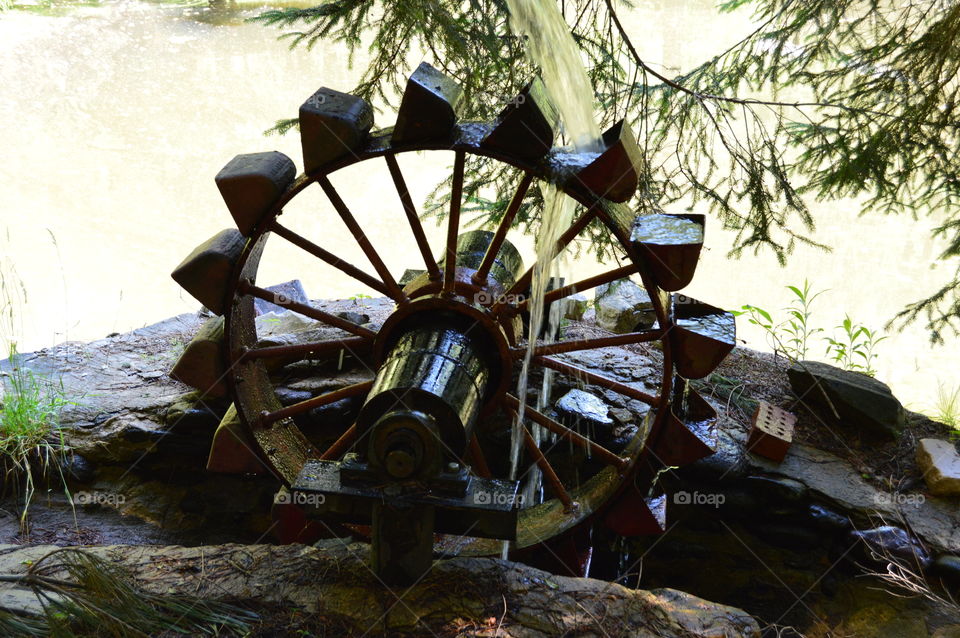 water wheel turns slowly through time