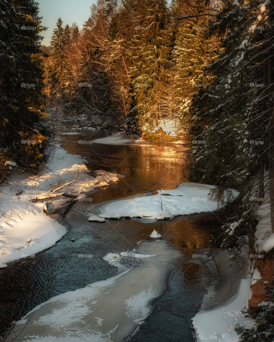 River Amata. Winter river. Snow. Stream.