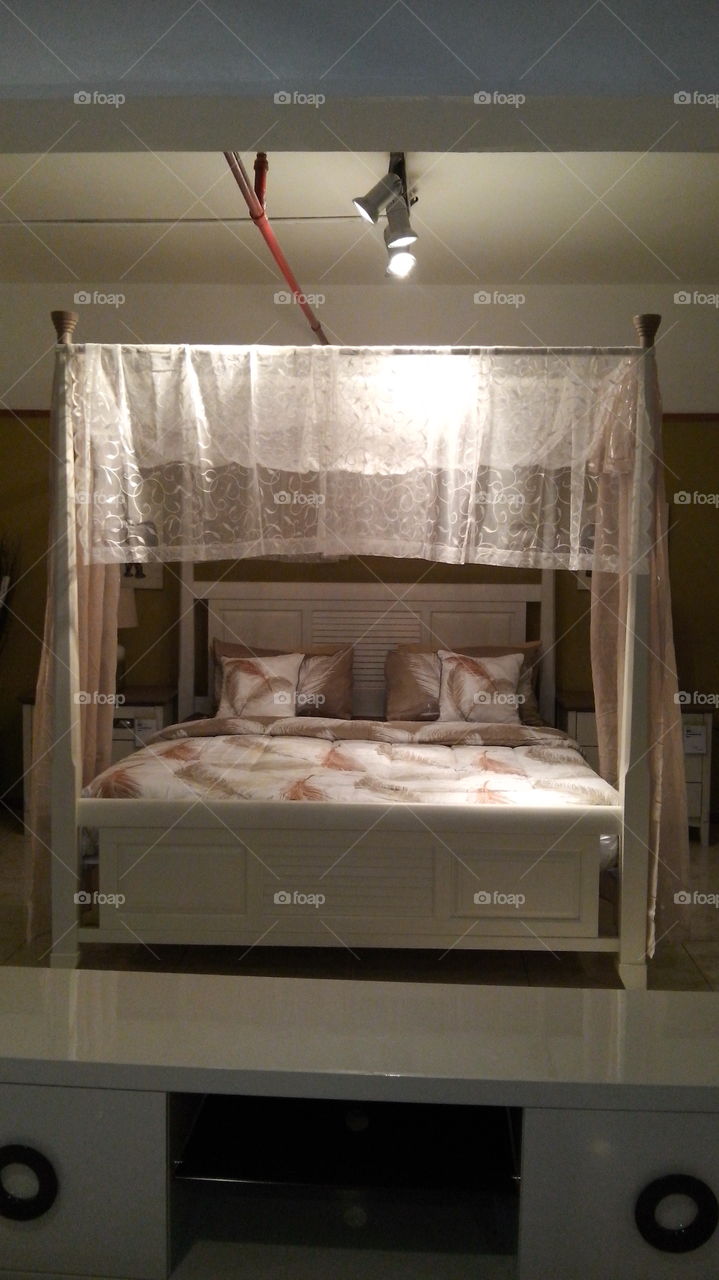 poster bed. classy bed
African design 
feather comforter