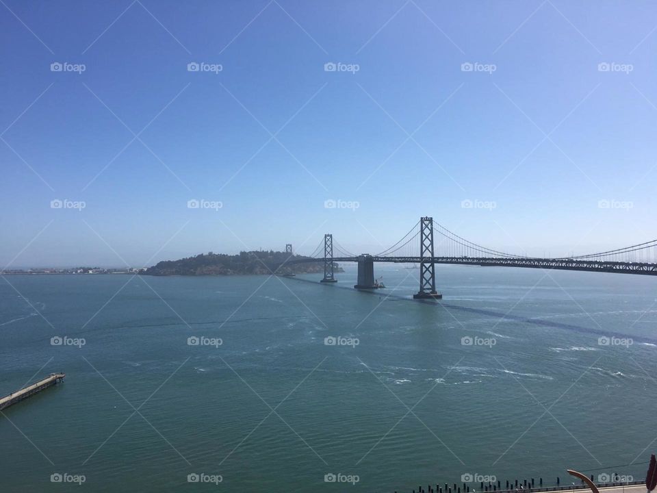 my husband has to travel alot for his work and sometimes I am able to tag along. Today he had to work on a building on the Embarcadero. This is a picture of the view from the roof of the building.