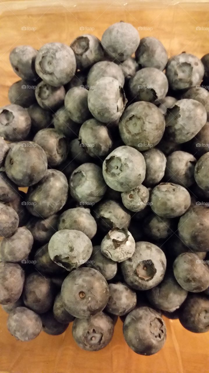 Blueberries. Found fresh blueberries for only 25 cents a pint! Bought 48 pints for 12 dollars .  Vacuum sealing then to the freezer.