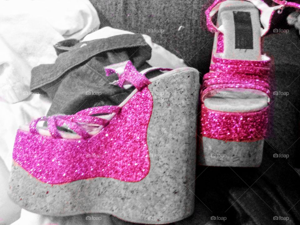 When I think of pink I think of the silliest shoes from when I was 18 years old. My first custom pair made 8" heels, pink glitter straps, cork wedges. Only worn twice and still look new but absolutely crazy!