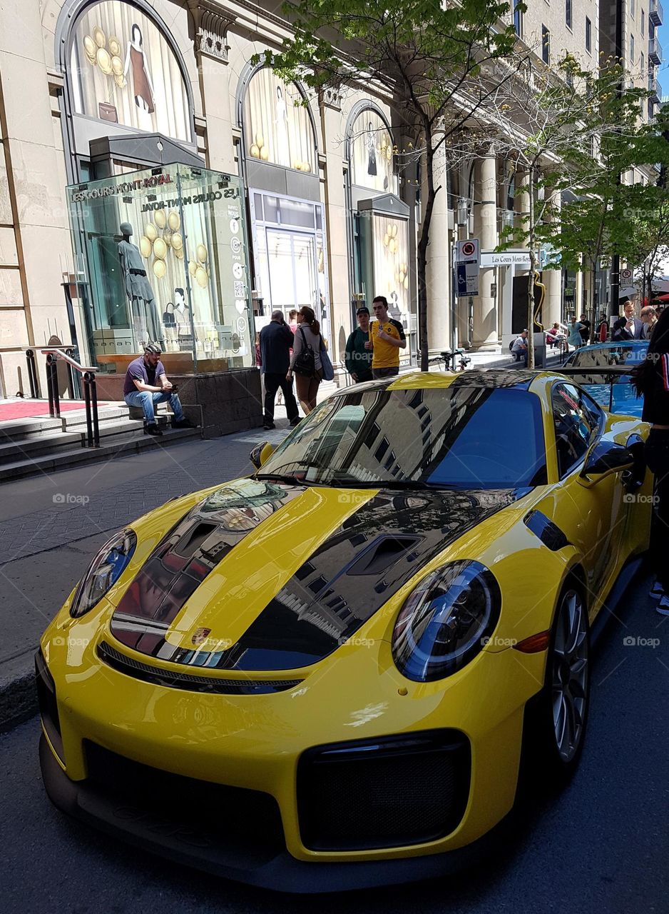 Yellow car on street