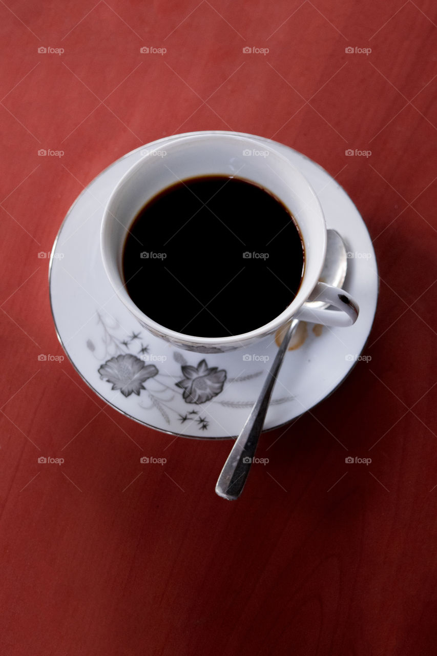A cup coffee at table
