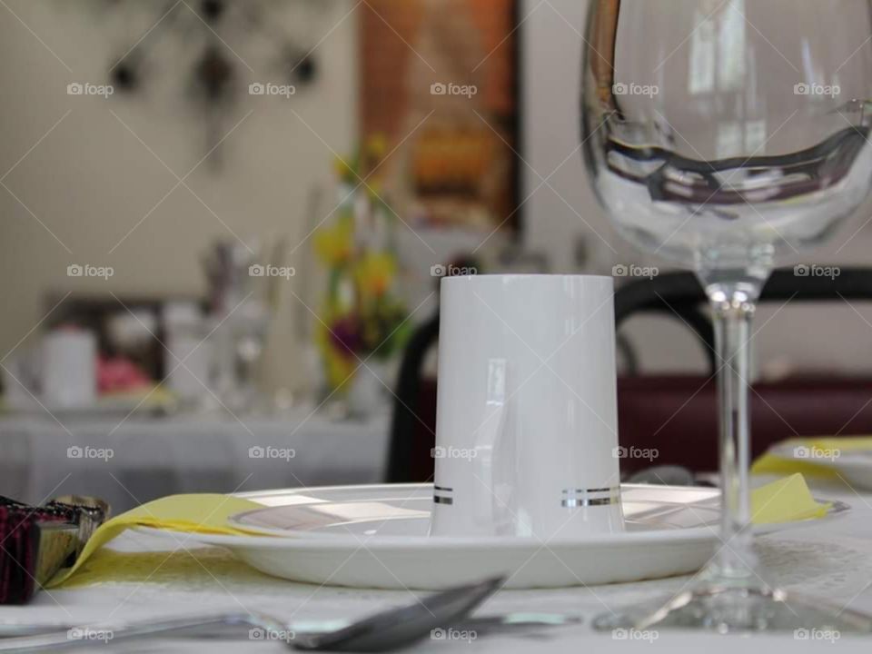 Table settings for a tea time brunch. Soft whites and yellows used