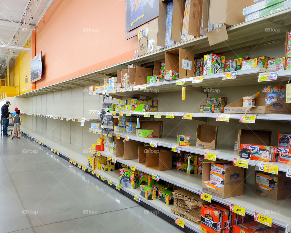 Empty toilet paper shelves in the super market during the start of the pandemic 2020