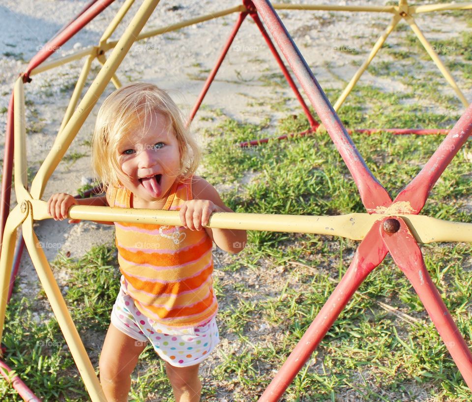 Girl playing in playground