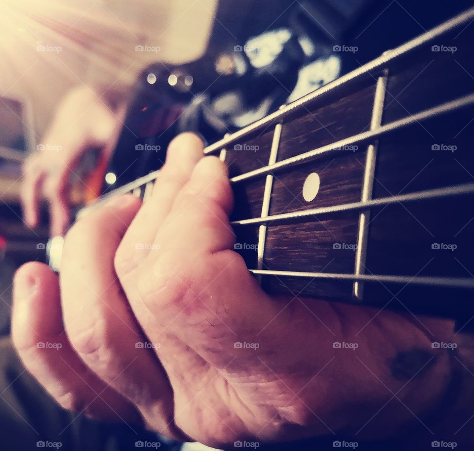 Close up of base guitar fretboard