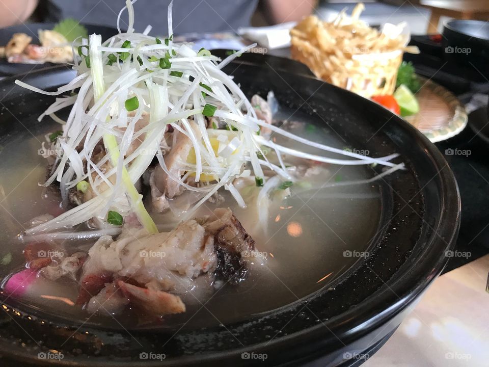 Japanese food in Thailand with some kind of fisho soup that make you feel good and would like to eat more