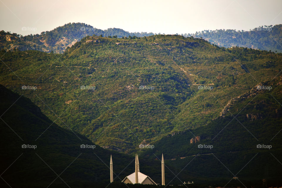 Faisal Mosque with the picturesque Margalla Hills in the background in Islamabad, Pakistan.