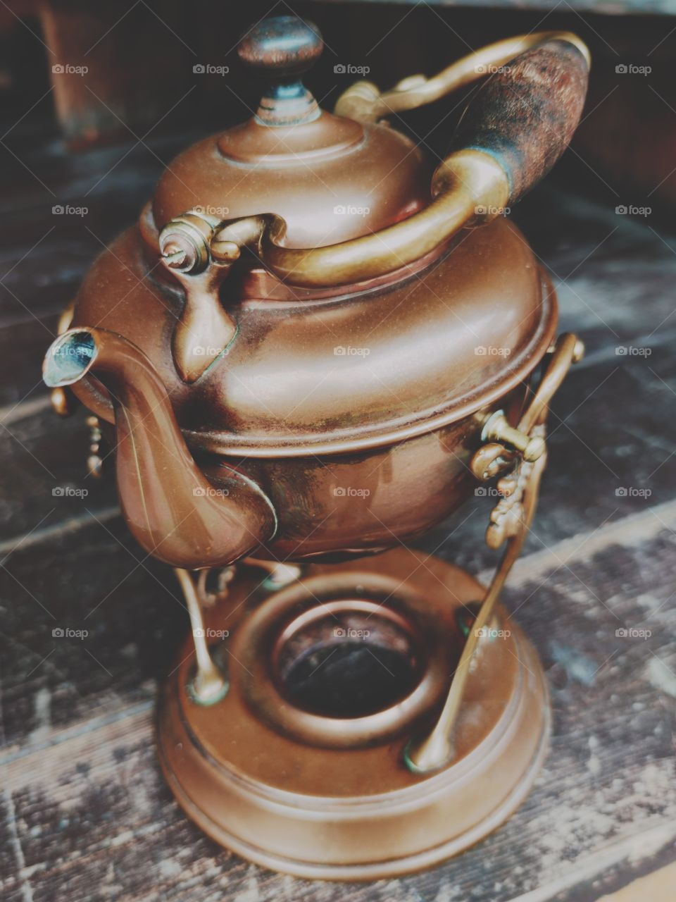 old copper kettle on a spirit lamp