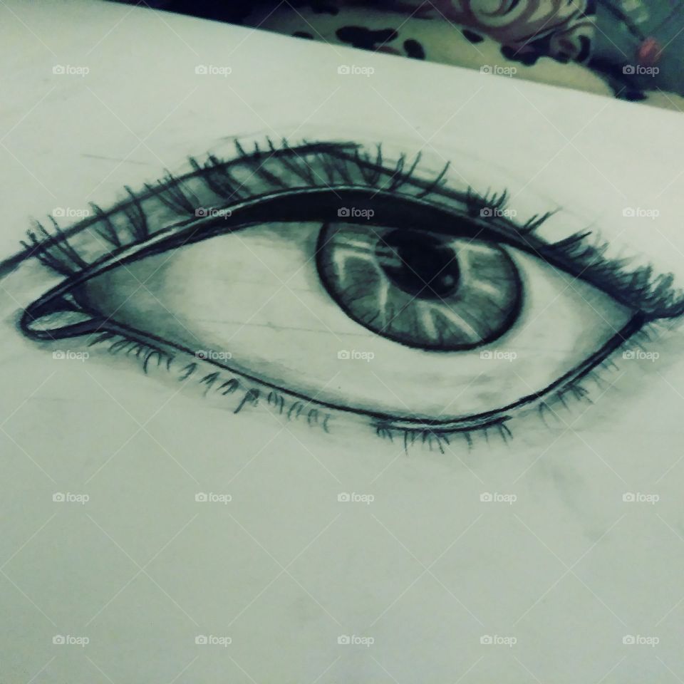 realistic charcoal sketch of an eye