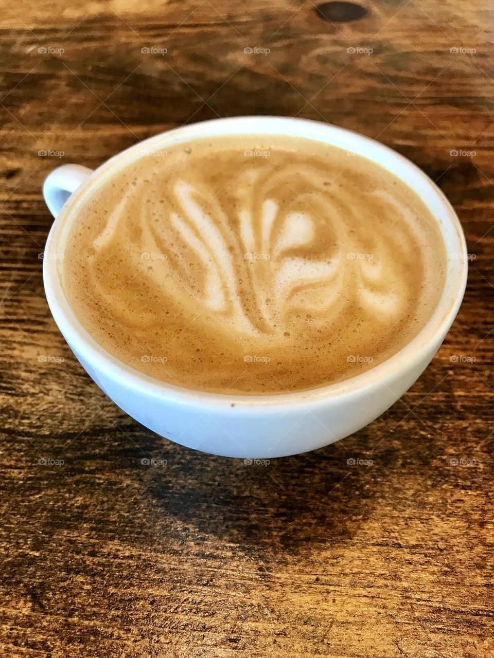 Latte on wood table