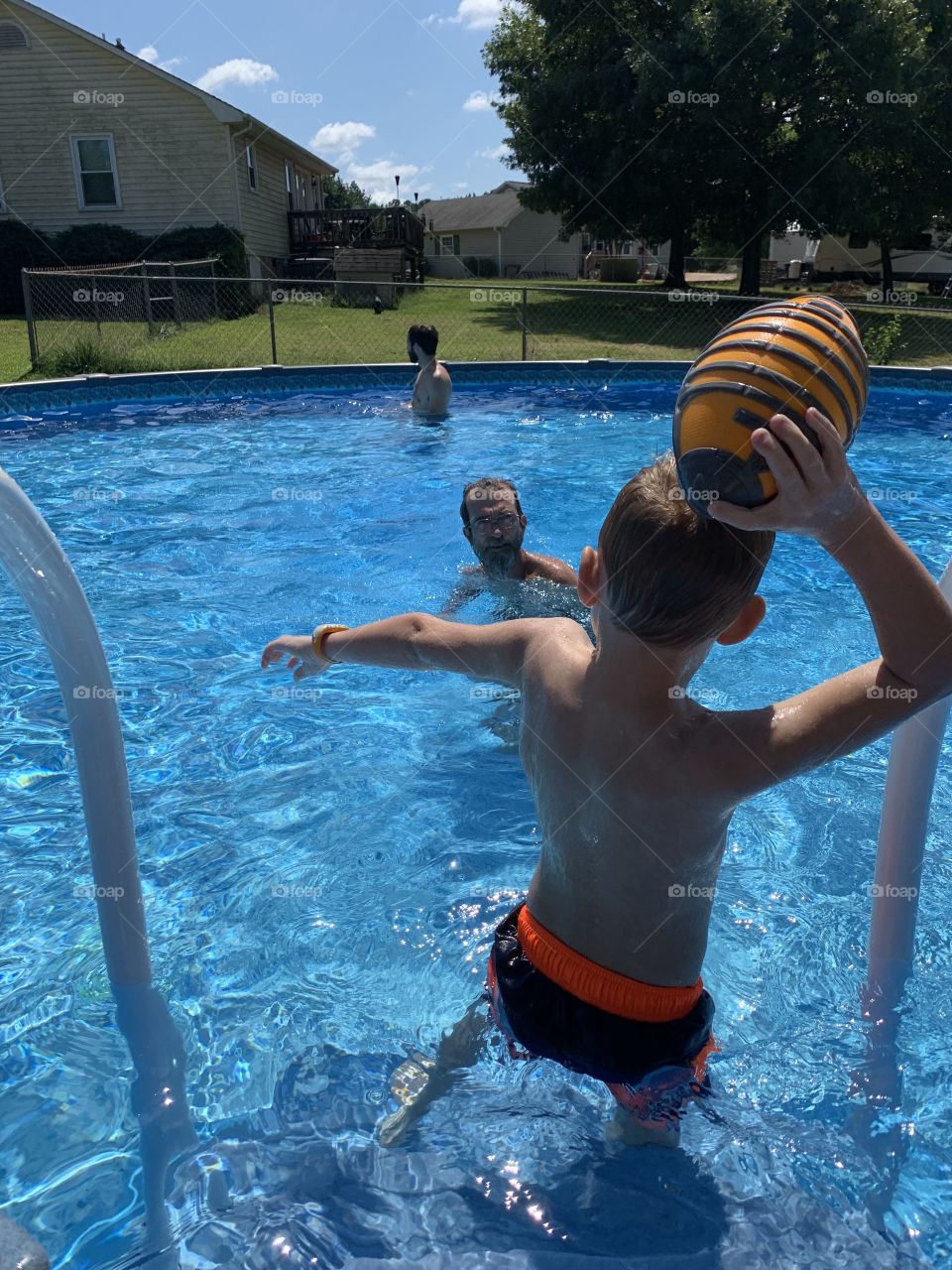 Family at the pool 