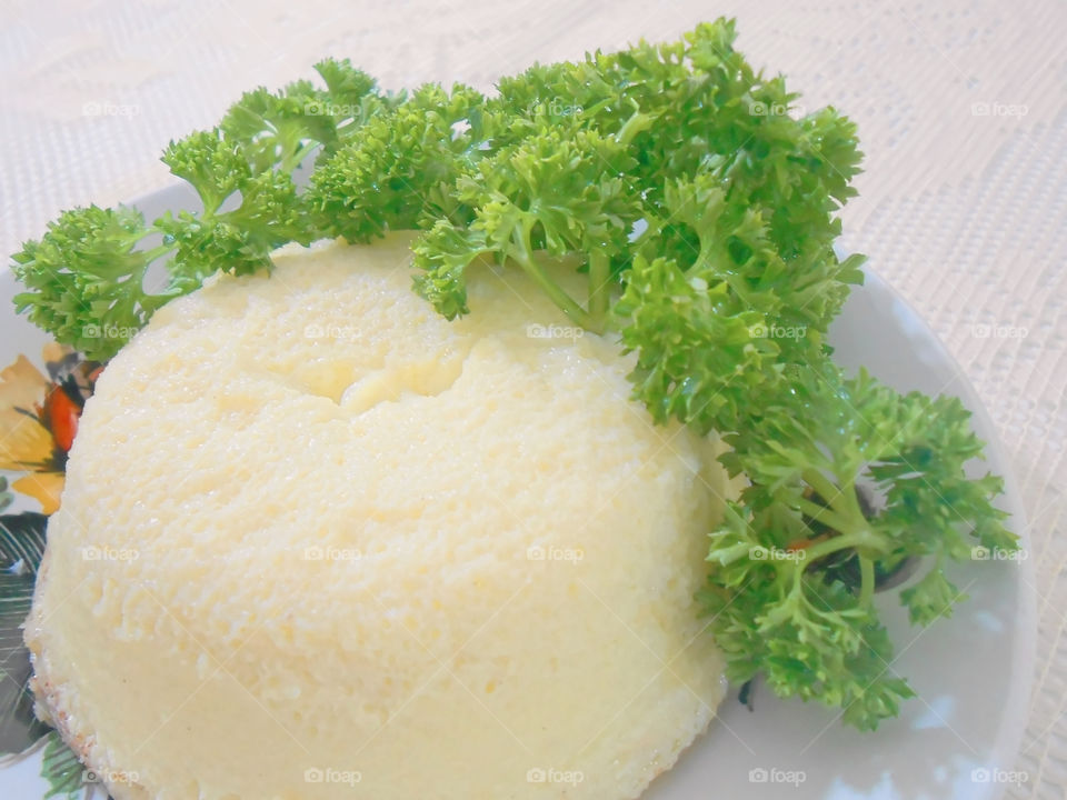 Closeup Homemade Egg Custard Decorated with Parsley