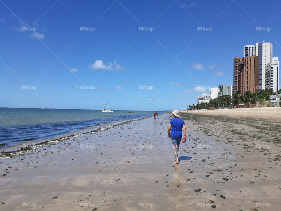 Morning walk on the beach of Candeias on another sunny day in the eternal summer of Pernambuco.