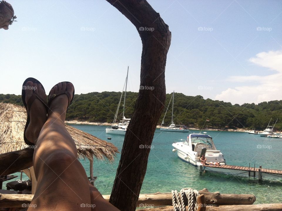 Treehouse in paradise . Having a cool drink on a hot day of island hopping around Croatia 