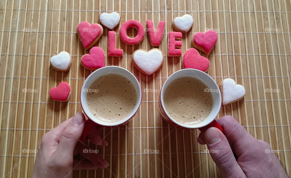 a couple drinking cofee on a Valentines day