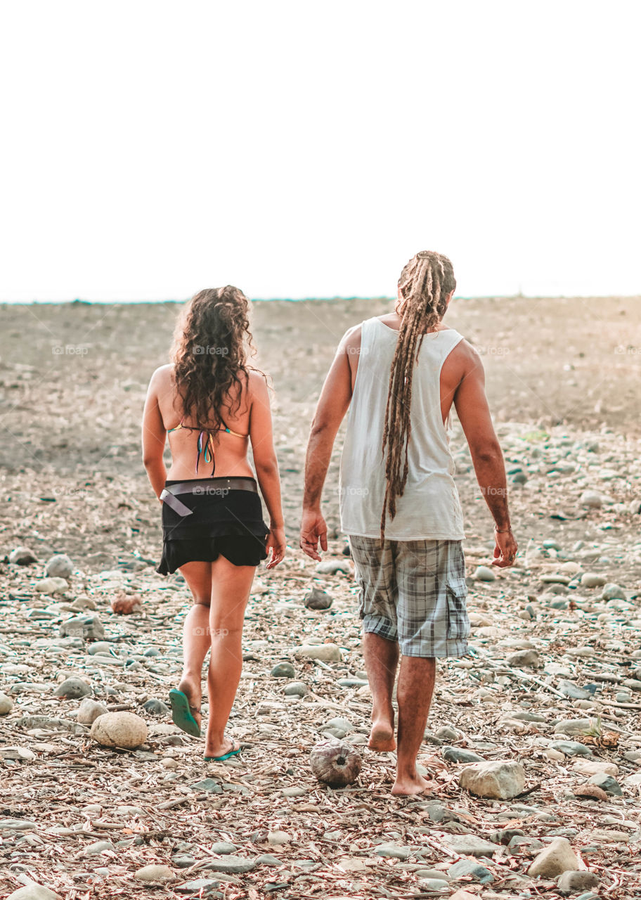 Couple walking on the beach