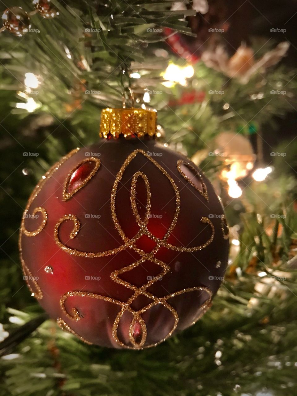 A Christmas ornament hanging on a Christmas tree 
