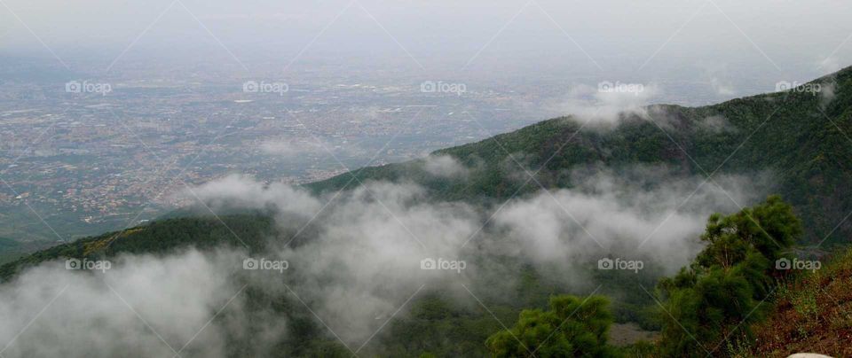 Panoramic view of foggy mountain